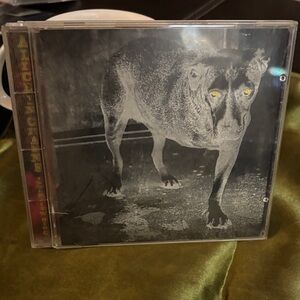 Alice in Chains, commonly known as the "Tripod" or "Dog Album".